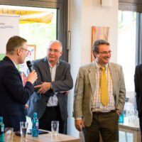Moderator und Dozenten im Fachgespräch mit dem Publikum. Fotograf-Düren-Veranstaltungsfotograf-Inden-Jülich-Linnich-Langerwehe